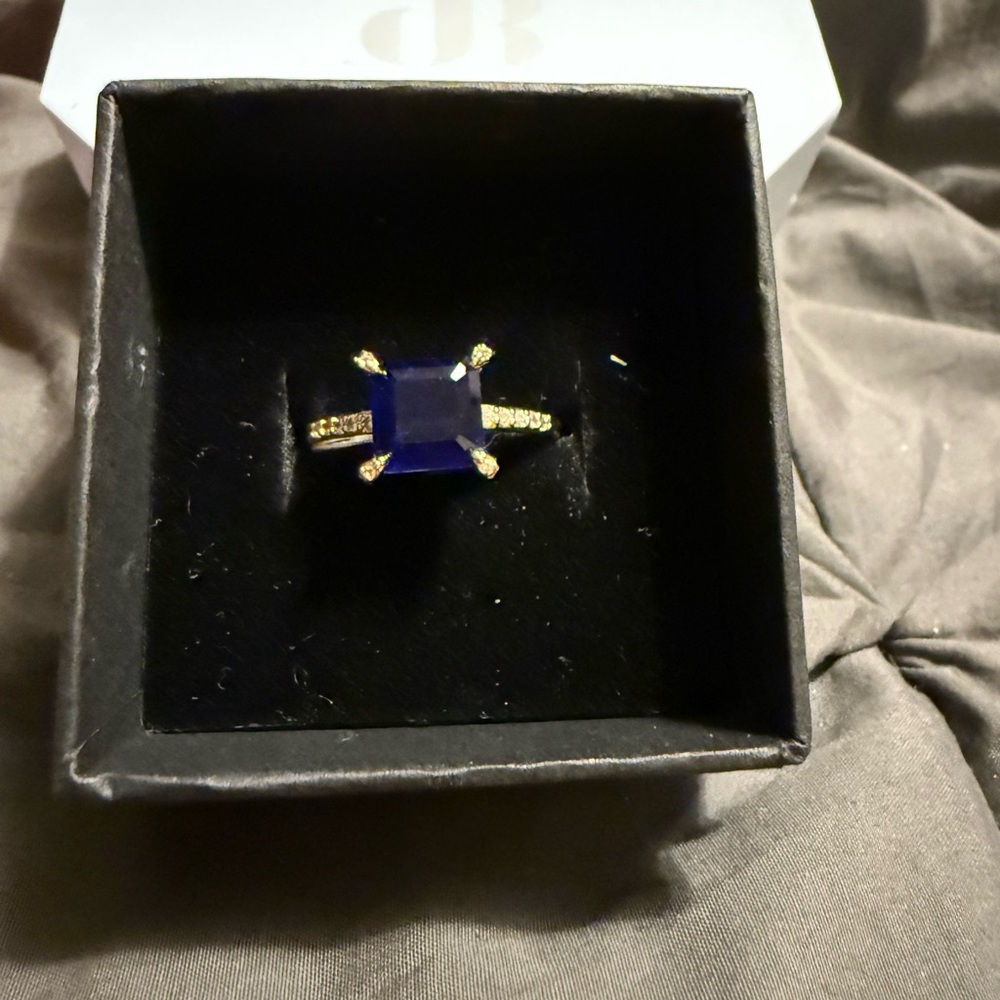 Bomb Party “Everlasting Grace” lab created sapphire on gold plating. Size 8 NWT